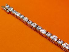 Afbeeldingen van “Klassieke zirkonia” tennisarmband in sterling zilver met ronde en vierkante kubiek zirkonia