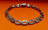 Afbeeldingen van “Achthoekige schakel” armband in sterling zilver waarbij elke tweede schakel ingelegd is met ronde kubiek zirkonia