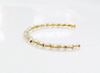 Picture of 3x3 mm, Czech faceted round beads, crystal, transparent, brassy gold-lined