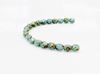 Picture of 3x3 mm, Czech faceted round beads, turquoise blue, opaque, picasso