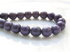 Picture of 8x8 mm, round, Czech druk beads, black, opaque, deep purple satin finishing, pre-strung, 25 beads