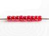 Picture of Czech seed beads, size 8, transparent, Siam ruby red, luster