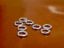 Picture of 4 mm, open jump rings, 21 gau, sterling silver, 2 pieces
